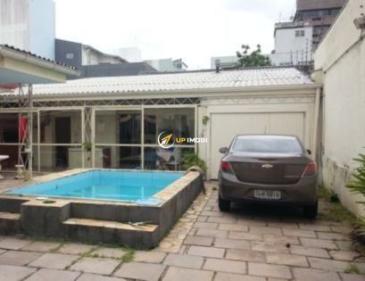 Casa com 330m², 5 dormitórios no bairro Menino Deus em Porto Alegre para Comprar