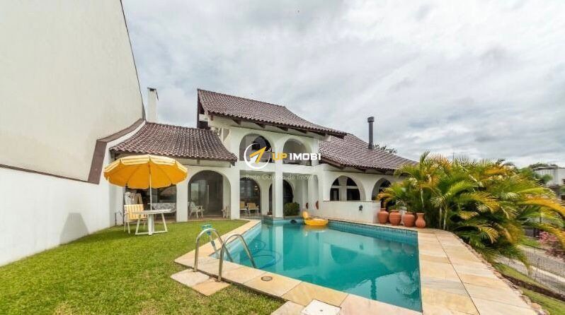 Casa com 456m², 3 dormitórios no bairro Vila Assunção em Porto Alegre para Comprar