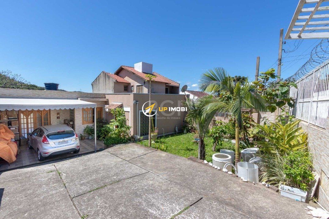 Casa, 4 dormitórios no bairro Lomba do Pinheiro em Porto Alegre para Comprar