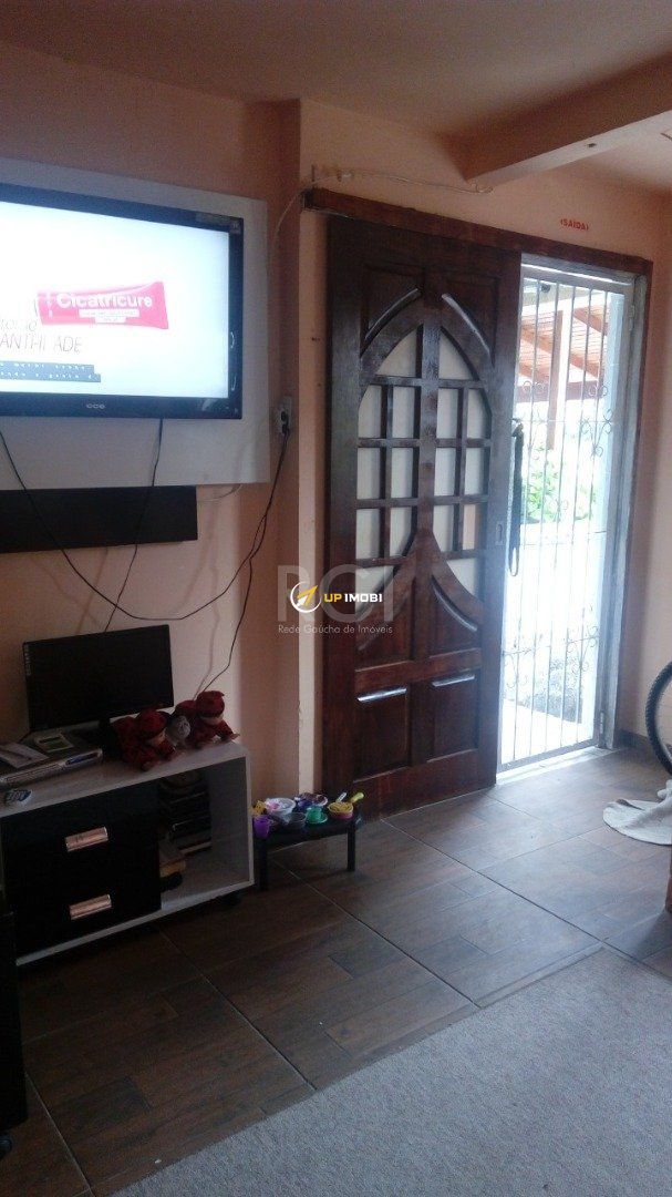 Casa de Condomínio com 180m², 4 dormitórios no bairro Espírito Santo em Porto Alegre para Comprar