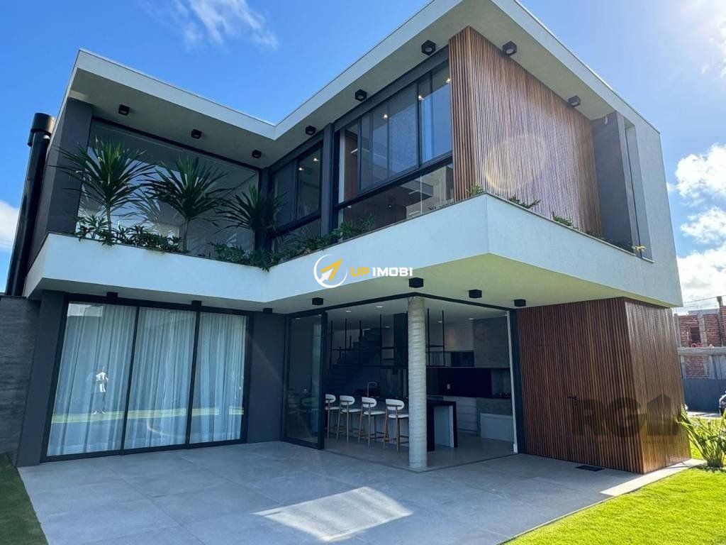 Casa de Condomínio com 200m², 4 dormitórios no bairro Centro em Xangri-Lá para Comprar