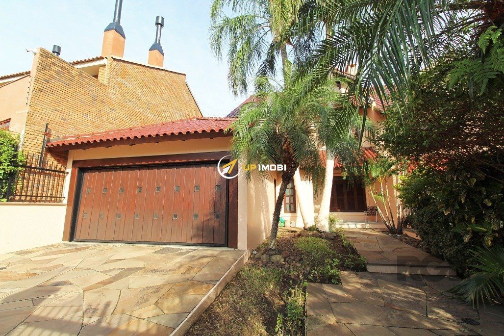 Casa com 381m², 4 dormitórios no bairro Chácara das Pedras em Porto Alegre para Comprar