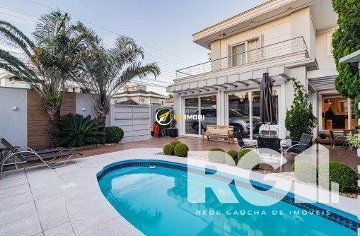 Casa com 295m², 3 dormitórios no bairro Marechal Rondon em Canoas para Comprar