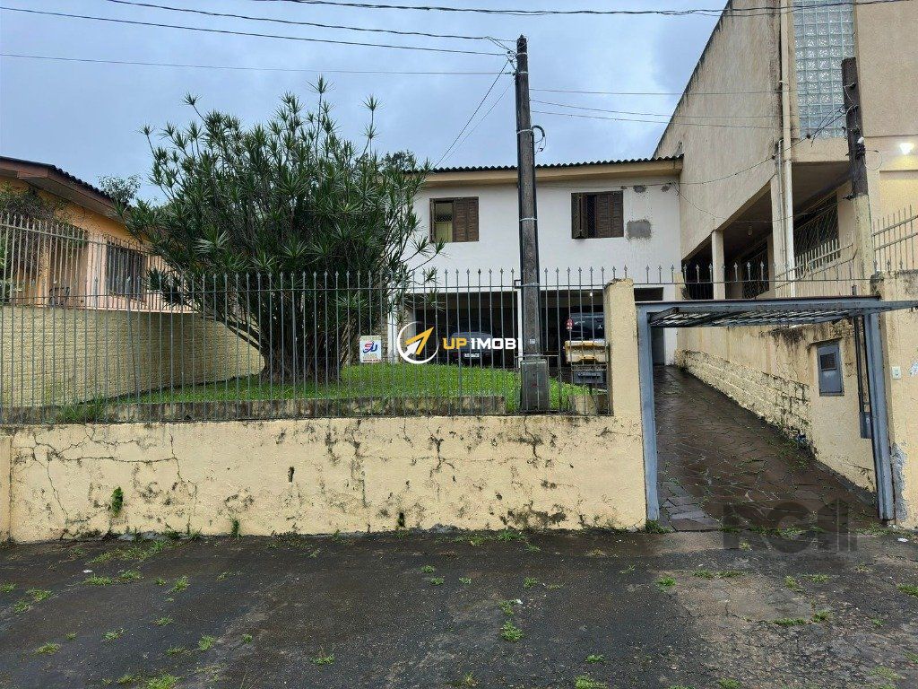 Casa com 129m², 3 dormitórios no bairro Morro Santana em Porto Alegre para Comprar