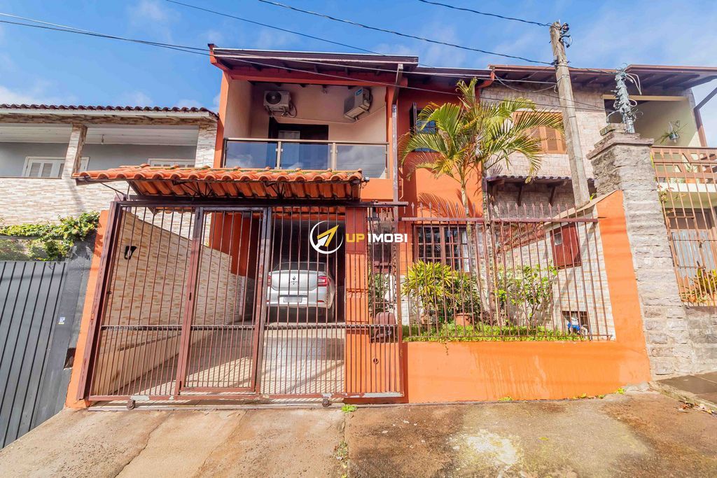 Casa, 3 dormitórios no bairro Rubem Berta em Porto Alegre para Comprar