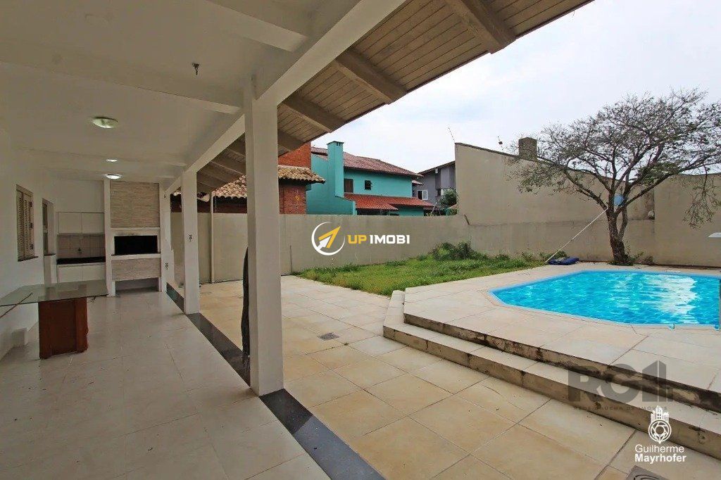 Casa com 412m², 4 dormitórios no bairro Marechal Rondon em Canoas para Comprar