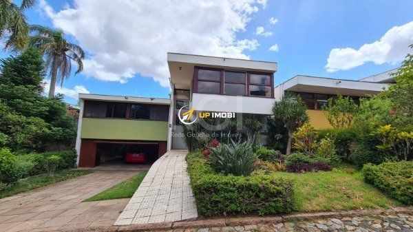 Casa de Condomínio com 300m², 4 dormitórios no bairro Santa Tereza em Porto Alegre para Comprar