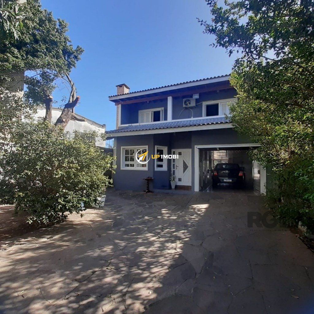 Casa com 880m², 5 dormitórios no bairro Hípica em Porto Alegre para Comprar