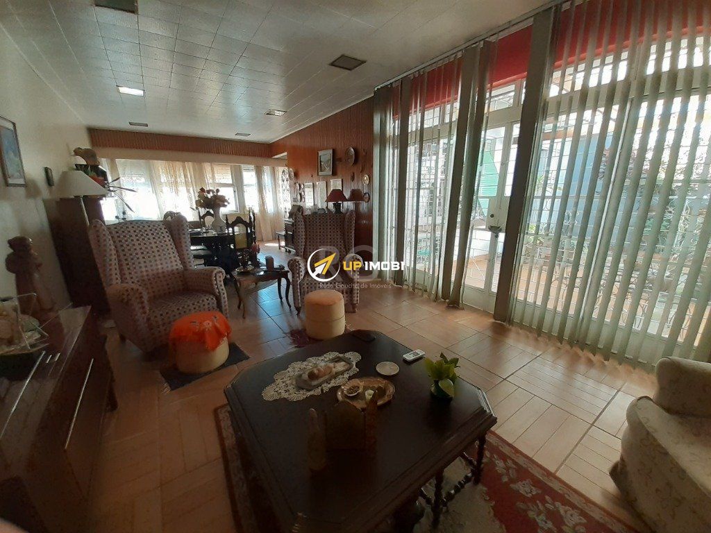 Casa com 290m², 3 dormitórios no bairro Menino Deus em Porto Alegre para Comprar