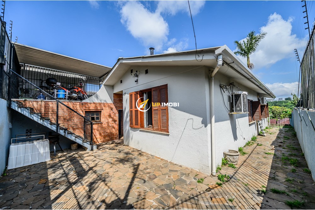 Casa com 129m², 3 dormitórios no bairro Santa Tereza em Porto Alegre para Comprar
