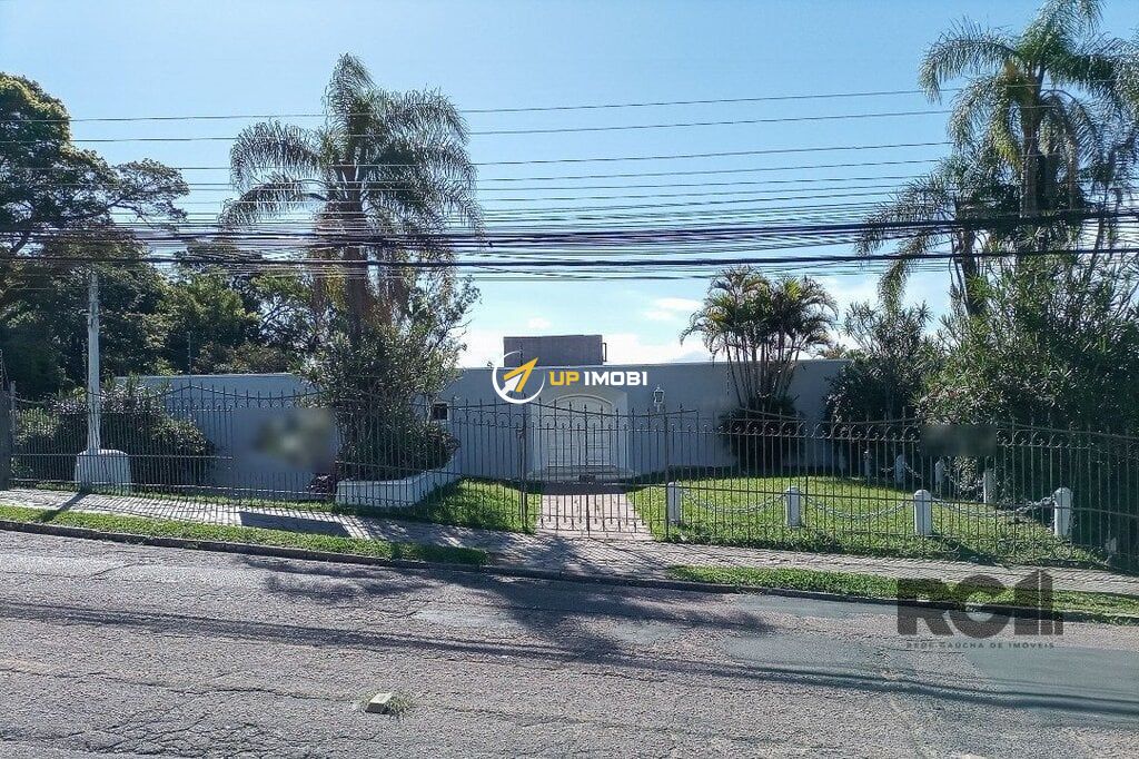 Casa com 580m², 3 dormitórios no bairro Santa Tereza em Porto Alegre para Comprar