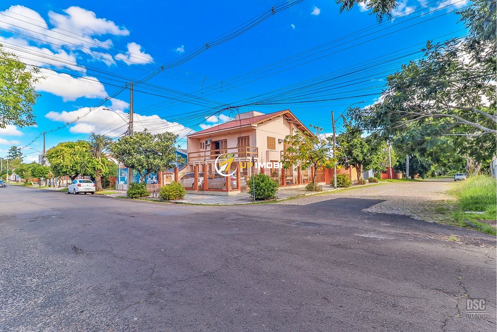 Casa com 321m², 6 dormitórios no bairro Rubem Berta em Porto Alegre para Comprar