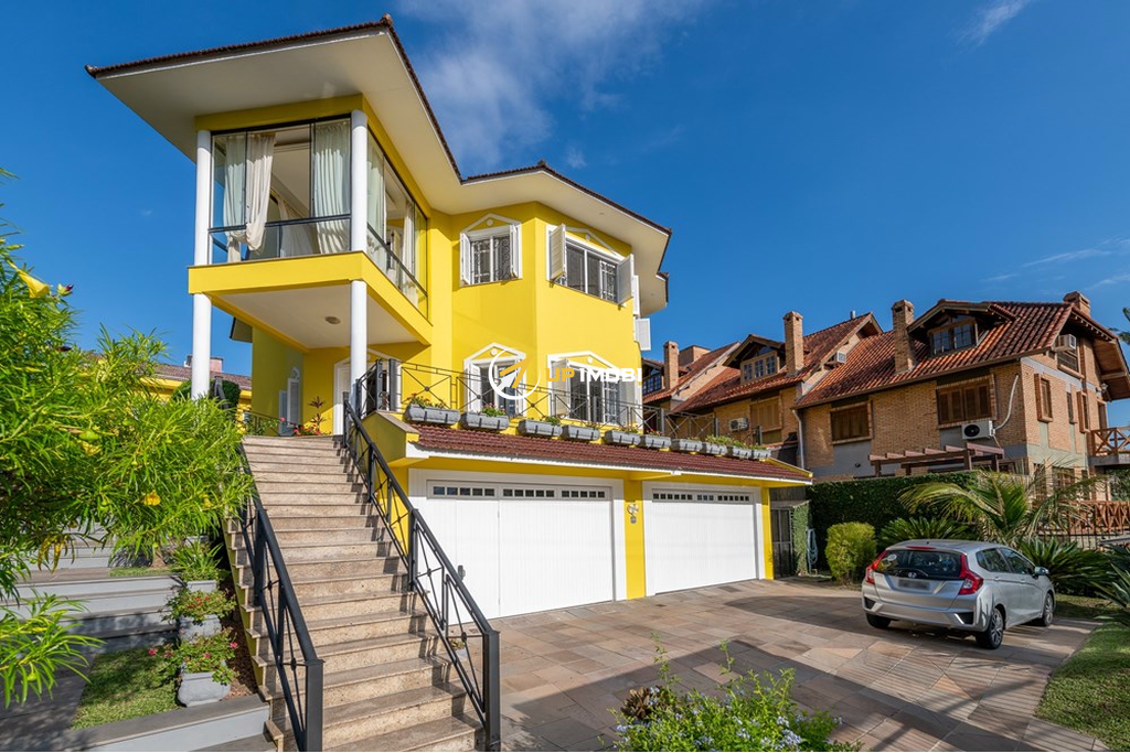 Casa com 607m², 4 dormitórios no bairro Ipanema em Porto Alegre para Comprar