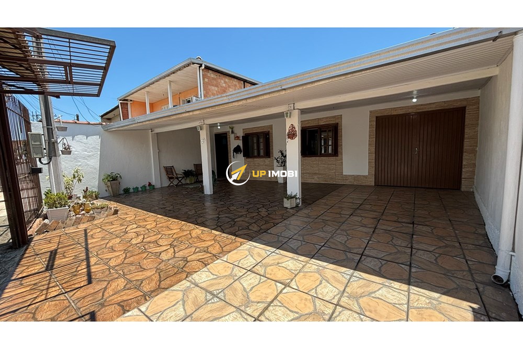 Casa com 98m², 2 dormitórios no bairro Guajuviras em Canoas para Comprar