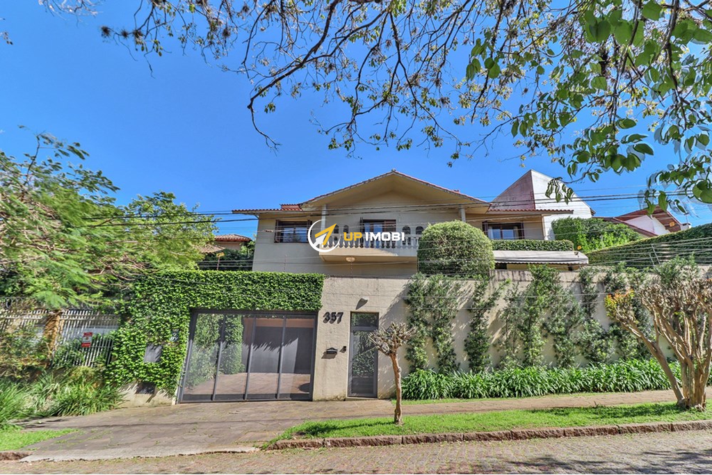 Casa com 640m², 4 dormitórios no bairro Três Figueiras em Porto Alegre para Comprar