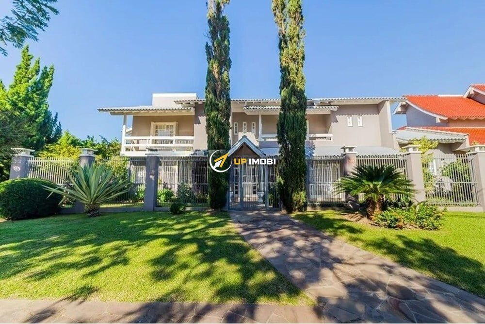 Casa com 391m², 4 dormitórios no bairro Marechal Rondon em Canoas para Comprar