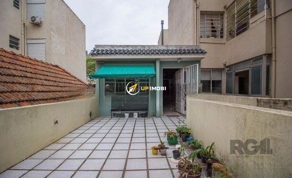 Casa, 4 dormitórios no bairro Rio Branco em Porto Alegre para Comprar