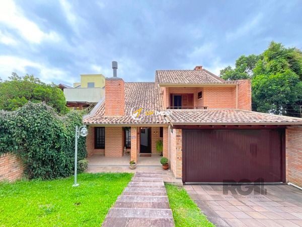 Casa, 3 dormitórios no bairro Nonoai em Porto Alegre para Comprar