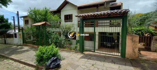 Casa, 6 dormitórios no bairro Nonoai em Porto Alegre para Comprar
