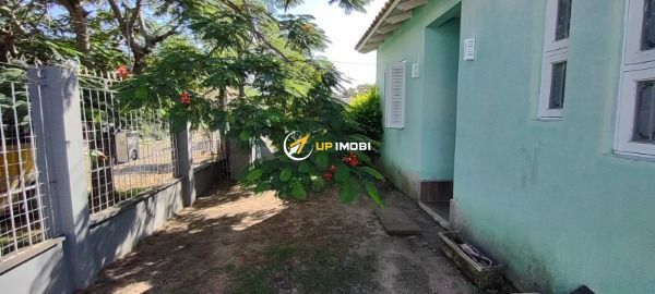 Casa, 3 dormitórios no bairro Guarujá em Porto Alegre para Comprar