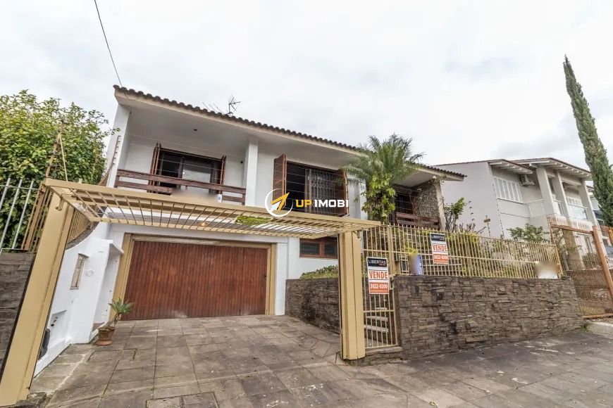 Casa, 3 dormitórios no bairro Jardim Itu em Porto Alegre para Comprar