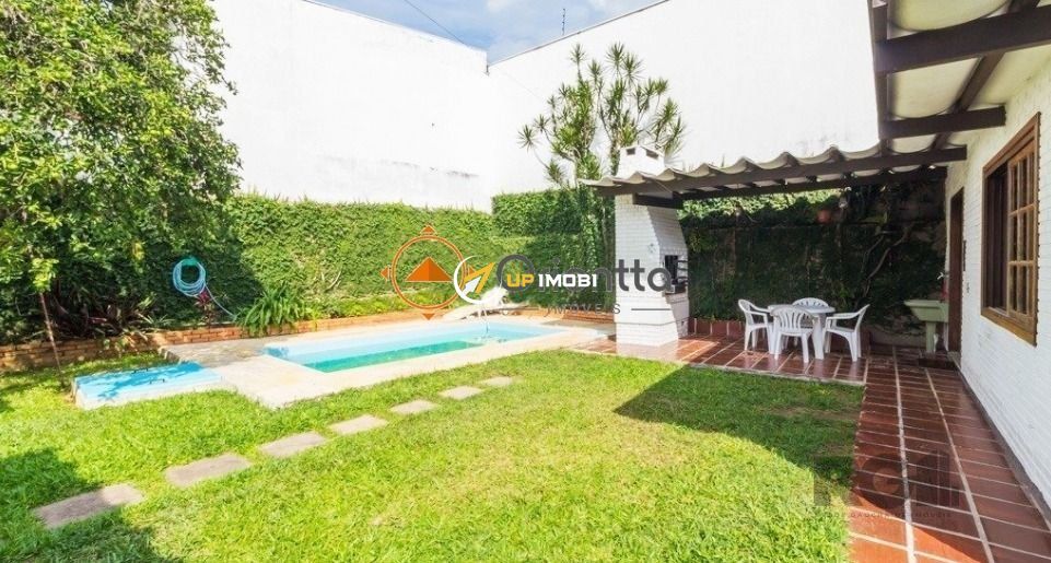 Casa, 4 dormitórios no bairro Chácara das Pedras em Porto Alegre para Comprar