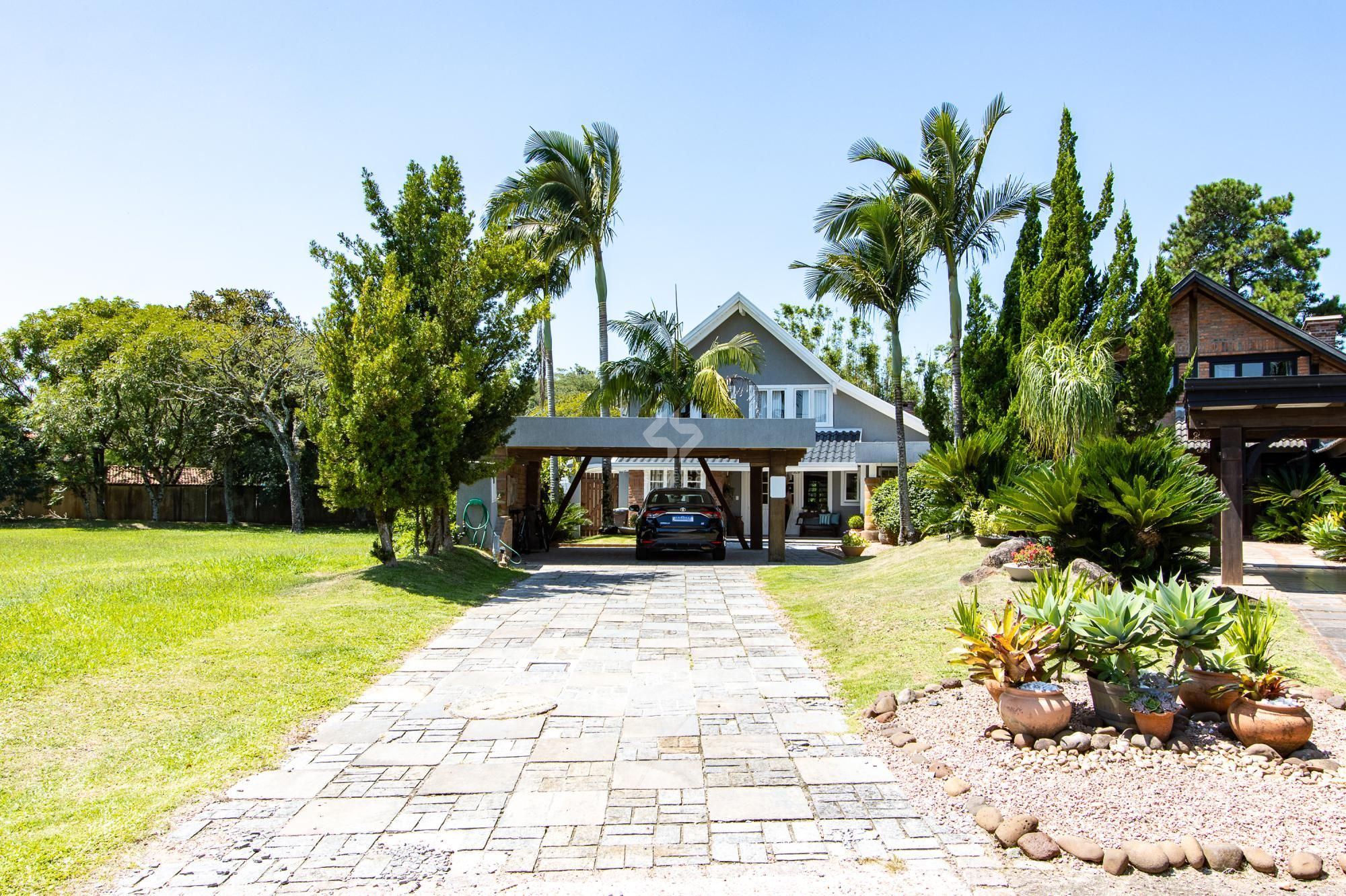 Casa 4 suites no Terra Ville, com home office, estar íntimo, 4 vagas e piscina.
