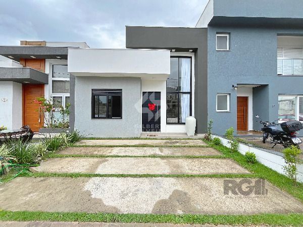 Casa Condominio em Porto Alegre, no bairro Hípica, com 3 dormitório(s), à venda.