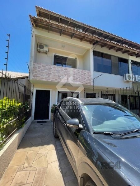 Casa em Porto Alegre, no bairro Hípica, com 3 dormitório(s), e 3 banheiros, à venda.