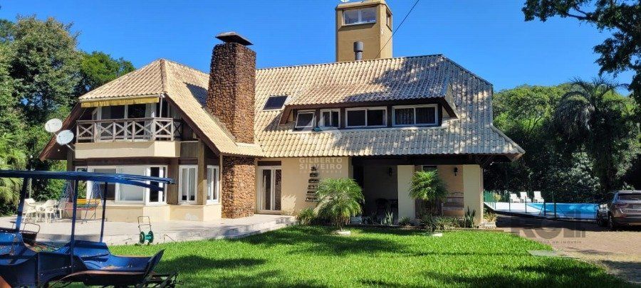 Venda Casa maravilhosa em terreno de 8.125m² com acesso ao Rio Guaiba, na Estrada Retiro da Ponta Grossa - Porto Alegre
