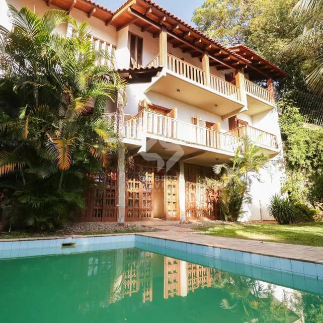 Casa à venda com 4 dormitorios no Bairro Nonoai - Porto Alegre