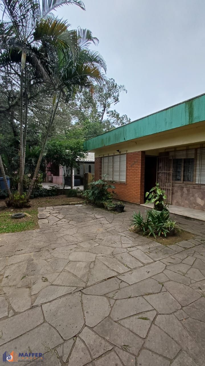 Casa 4 dormitórios, terreno com 1639m² à venda no Morro Santana
