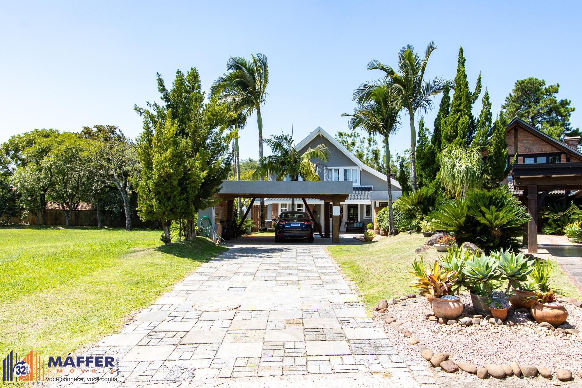 Casa 4 suites no Terra Ville, com home office, estar íntimo, 4 vagas e piscina.