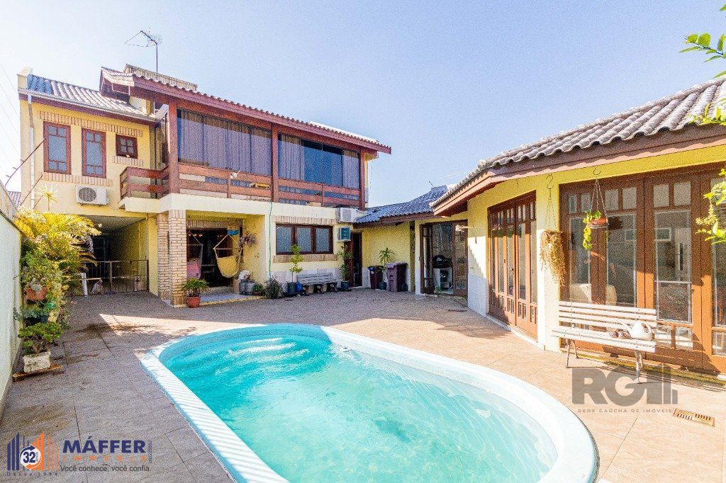 Casa de 4 dormitórios 304m² no bairro Jardim Lindóia