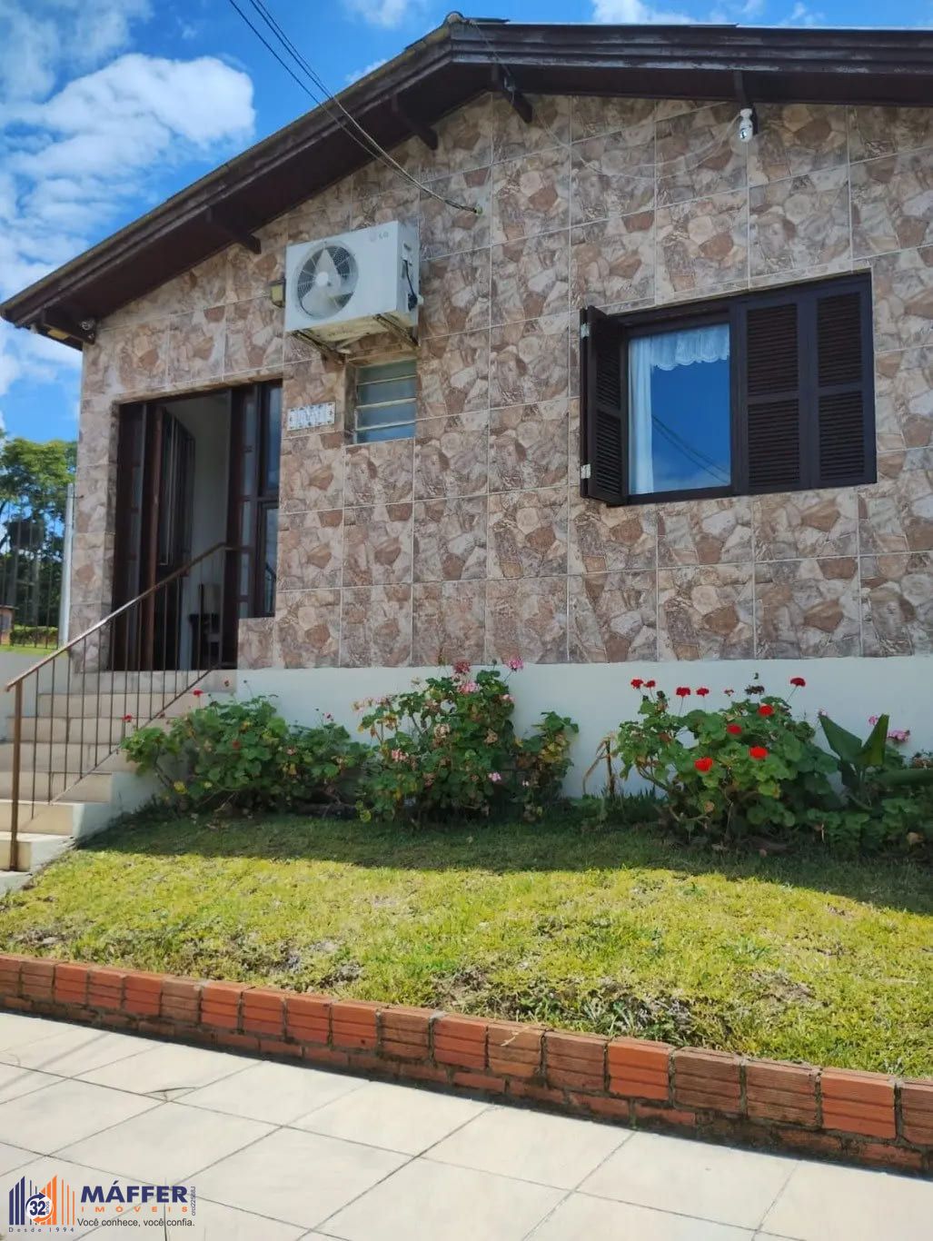 Casa de 3 dormitórios e 111m² à venda em Jardim Botânico, Porto Alegre.