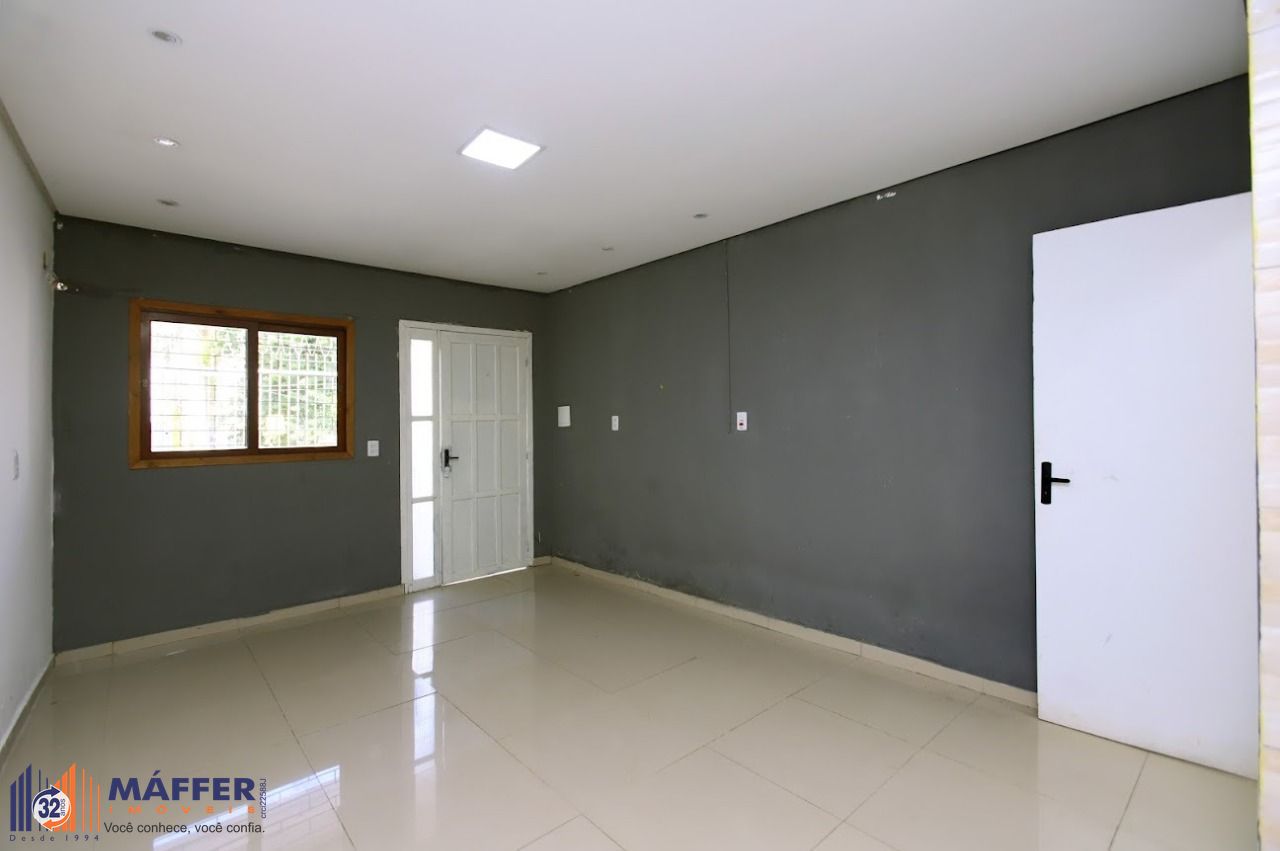 Casa com 65m², localizada no bairro Jardim Europa em Porto Alegre/RS.