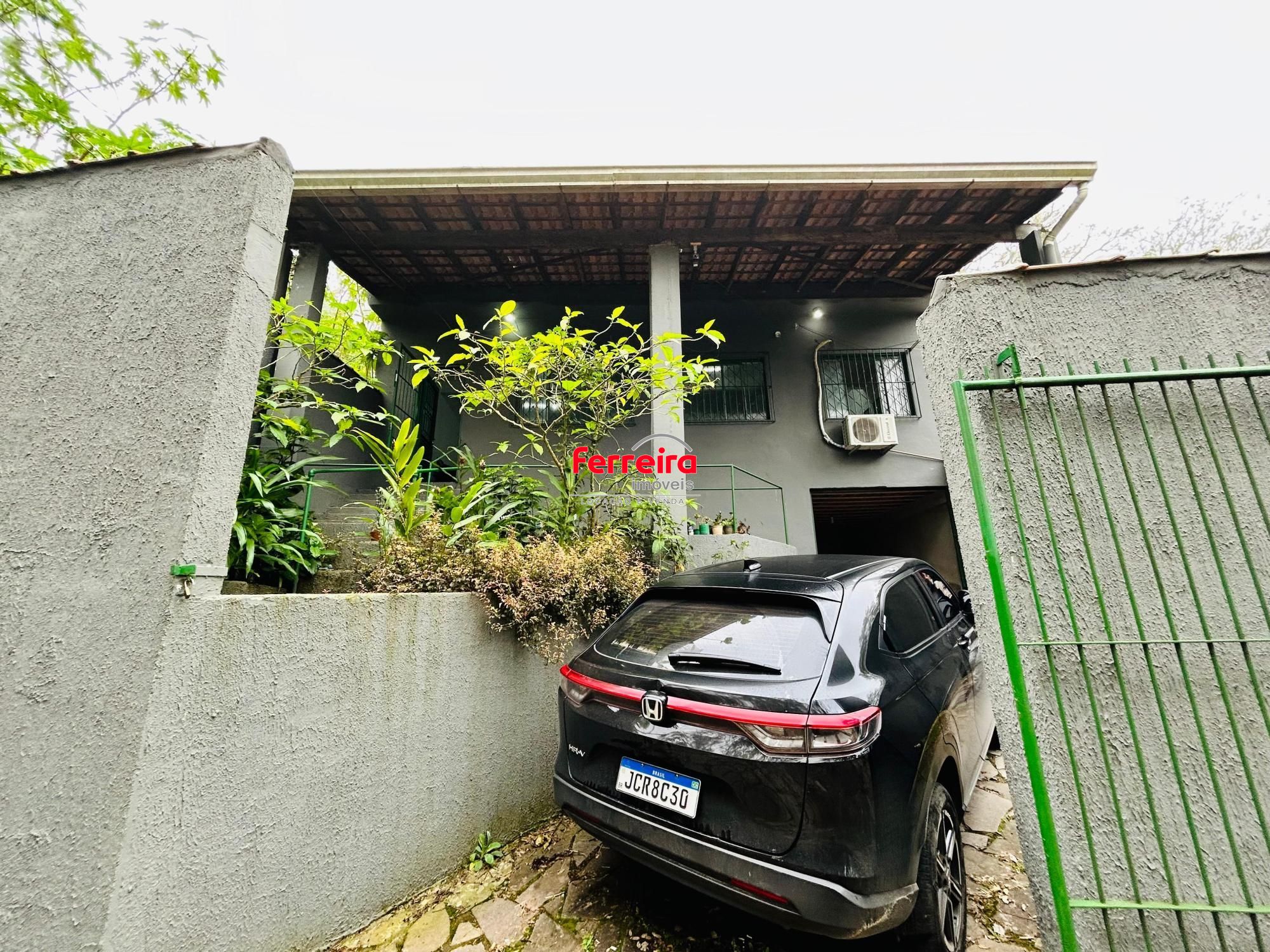 Casa de 2 dormitórios com duas vagas no Bairro Lomba do Pinheiro