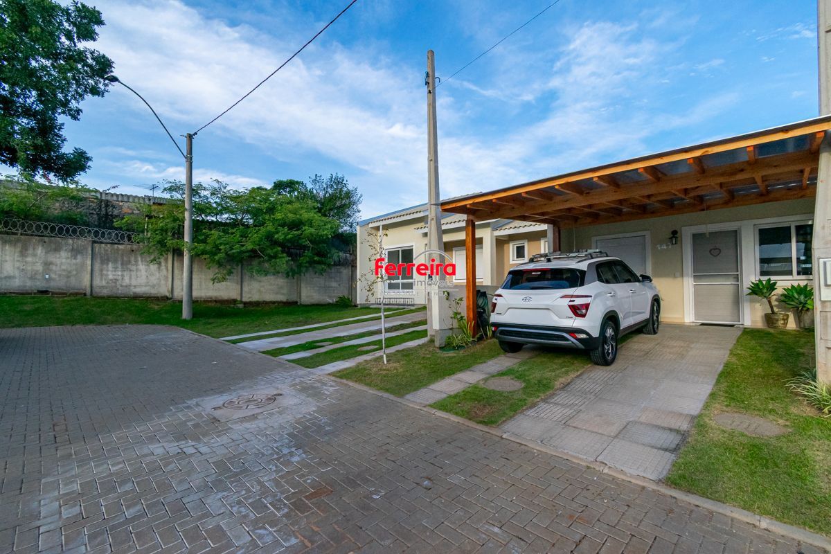 Casa 2 Dormitórios no Villaggio Blu, Pátio, 2 Vagas, Semi-Nova em Cachoeirinha