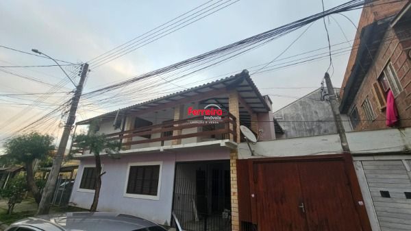 Casa em Porto Alegre, no bairro Hípica, à venda.