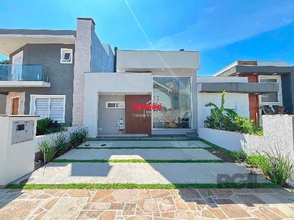 Casa Condominio em Porto Alegre, no bairro Hípica, com 3 dormitório(s), e 3 banheiros, à venda.