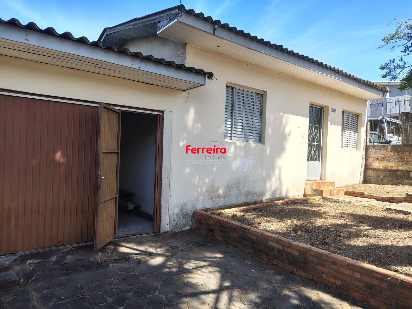 Casa térrea no bairro Vila Nova.