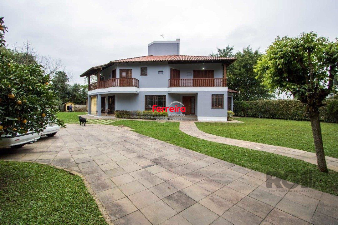 Sobrado com 6 suites, lareira, lavabo, pátio - Bairro Belém Velho