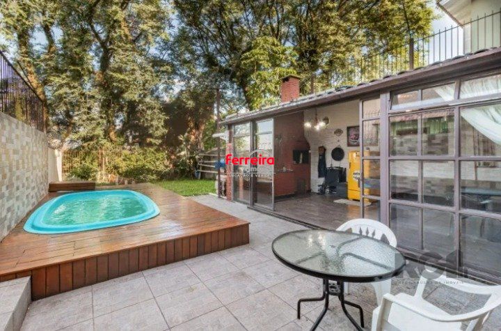 Casa 4 quartos à venda, 264m², Santo Antônio - Porto Alegre