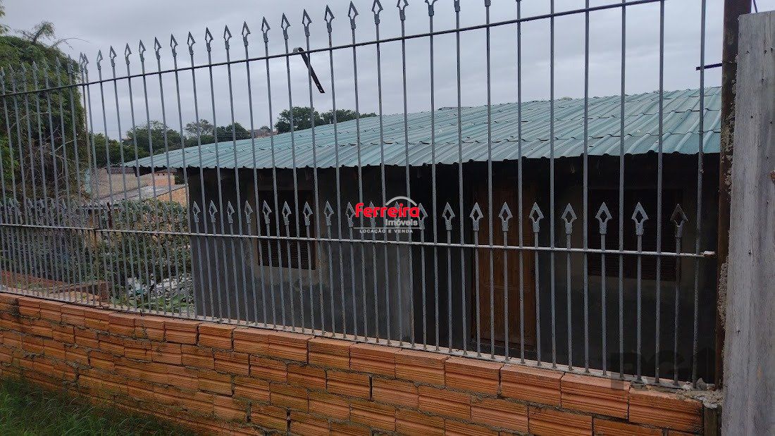 Casa de dois dormitórios localizada no Bairro Nonoai