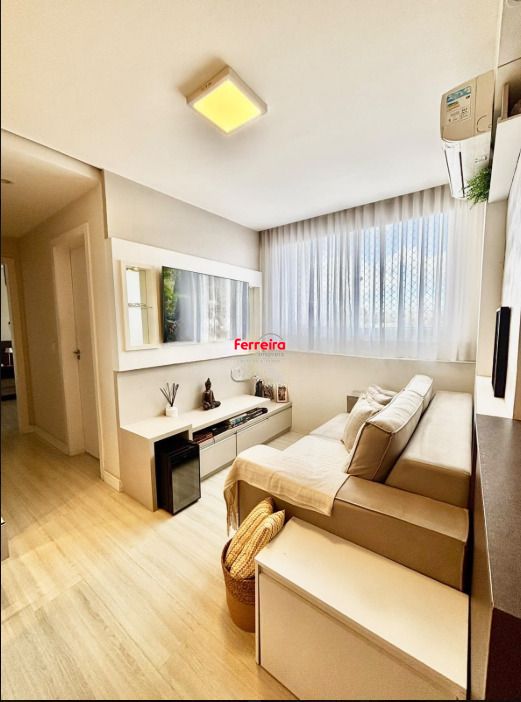Apartamento à venda com 2 dormitórios, 48m², suíte e vaga de garagem.