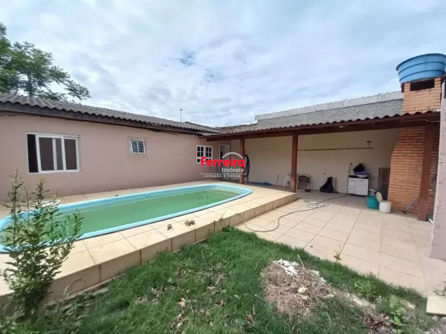 Casa de alvenaria com pátio, piscina Igui e churrasqueira no Parque dos Eucaliptos em Gravataí/RS