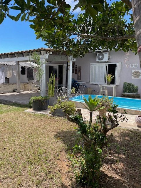 Casa à venda com 2 quartos, 80m², 3 vagas, Rua Morro Agudo no bairro Campo Novo em Porto Alegre