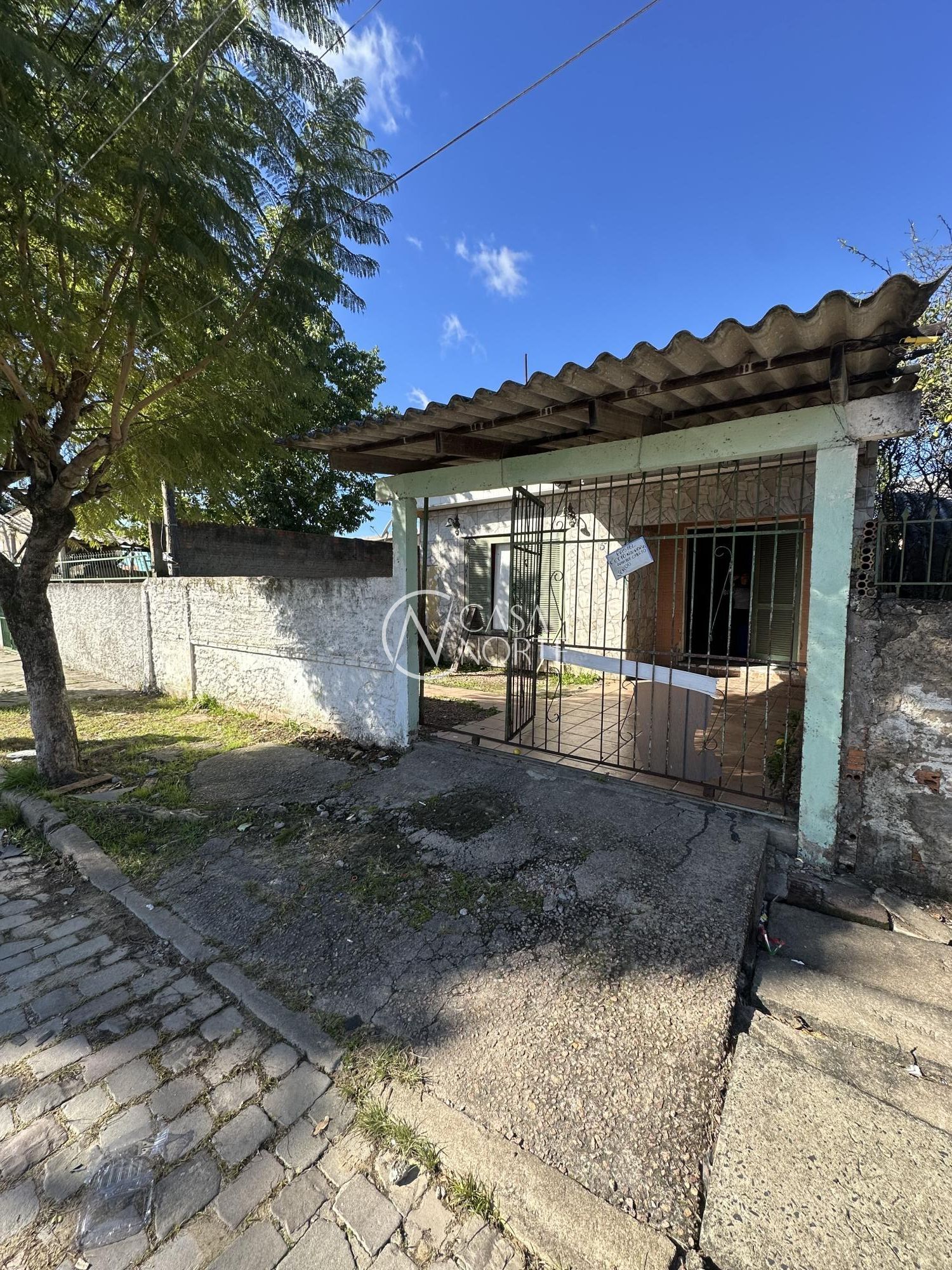 Casa à venda com 2 quartos, 85m², 2 vagas, Rua Manoel Faria da Rosa Primo no bairro Restinga em Porto Alegre