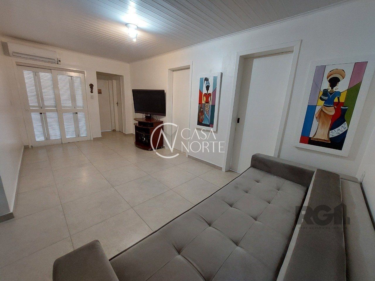 Casa à venda com 3 quartos, 110m², 3 vagas, Rua Oswaldo Olmiro Machado no bairro Ipanema em Porto Alegre