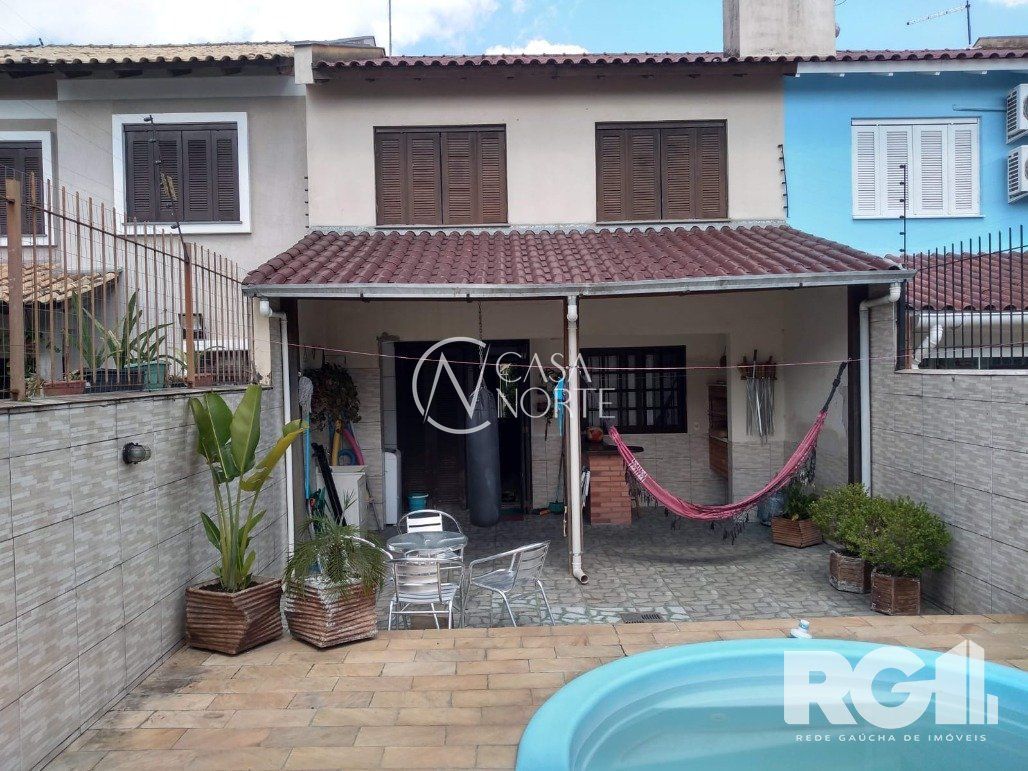 Casa à venda com 3 quartos, 122m², 1 suíte, 2 vagas, Rua Doutor João César Krieger no bairro Parque Santa Fé em Porto Alegre